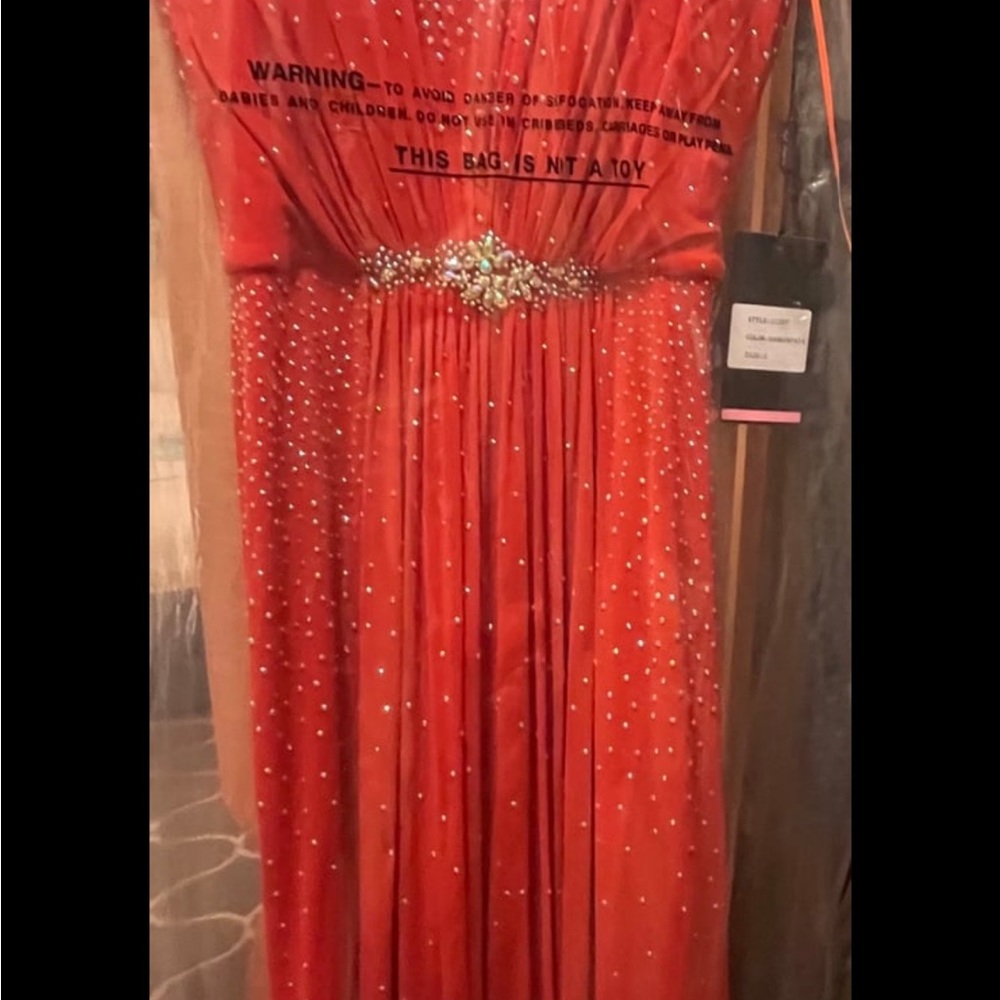 Elegant Red Gown with Embellishments